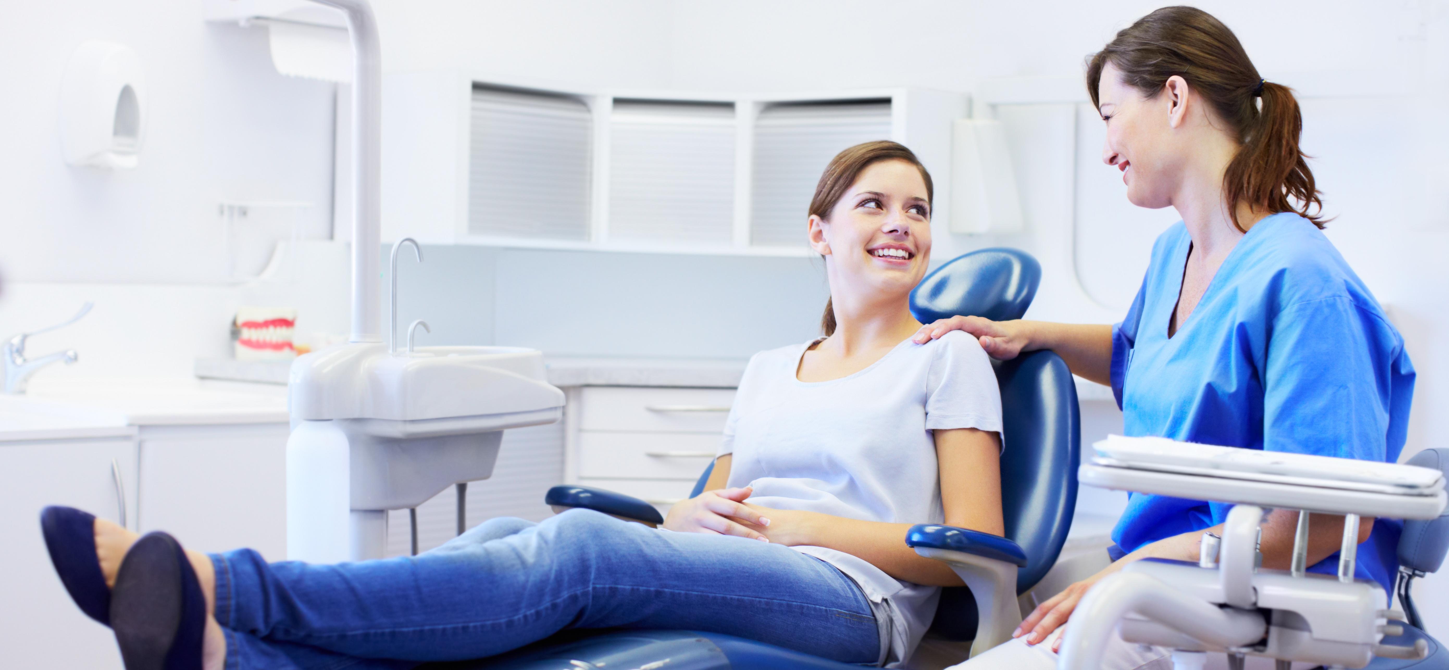 Dentist with happy patient